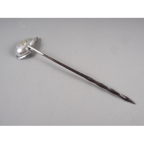 258 - A Georgian silver toddy ladle with twisted whale bone handle, 14 3/4