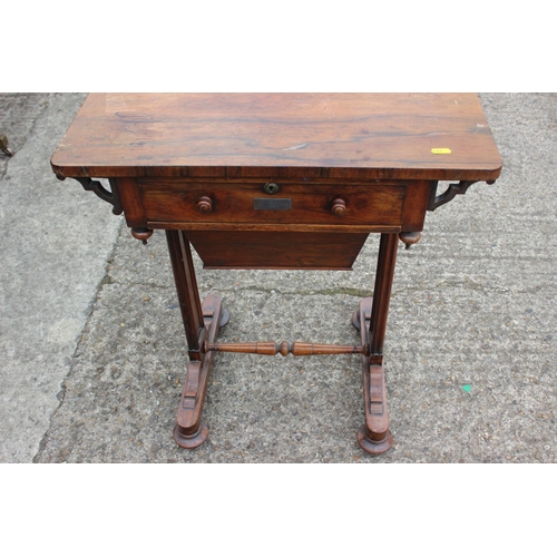 420 - A Victorian rosewood work table, fitted one drawer with well, on end supports and turned feet, 23 1/... 