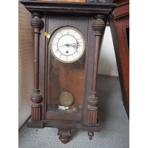 103 - A 1930s Ansonia oak cased wall clock with silvered dial, 33