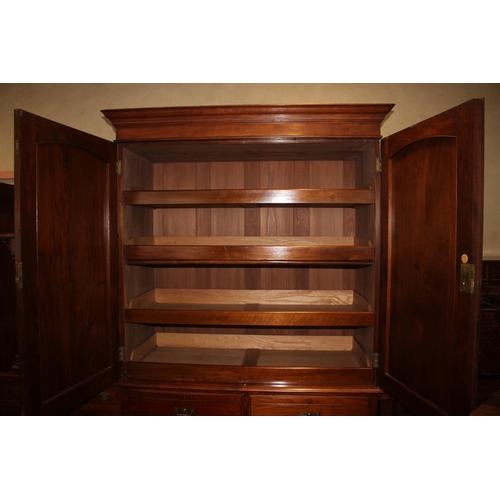 418 - A Maples 19th century walnut linen press, the upper section fitted slides enclosed two doors over tw... 