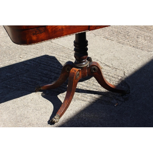 410 - A William IV rosewood and mahogany strung fold-over top card table, on turned column and quadruple s... 