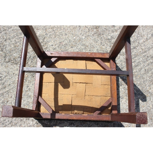 407 - A late Georgian mahogany stool with gros point seat, on chamfered and stretchered supports, 19 1/2