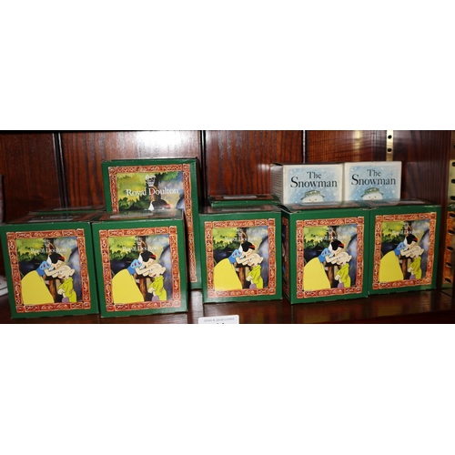 11 - A Royal Doulton Snow White and the Seven Dwarves set, all boxed, and two Royal Doulton “The Sn... 