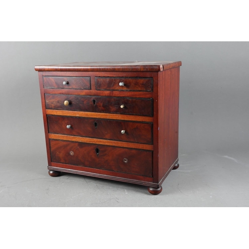 133 - An Edwardian mahogany and line inlaid miniature chest of two short and three long graduated drawers,... 