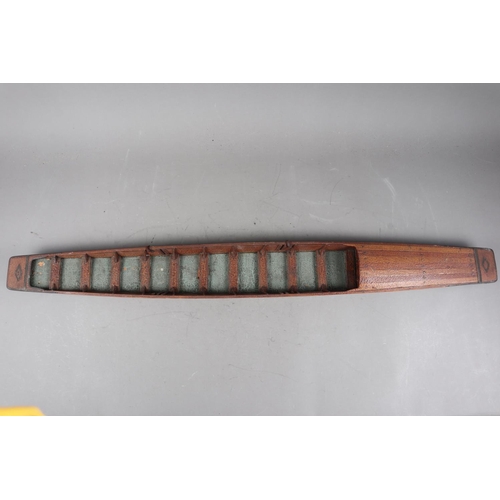 194 - An early 20th century hardwood model punt, Makers label: 