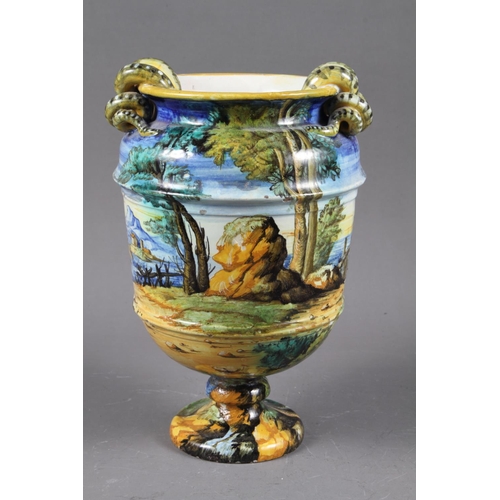 65 - A Cantagali blue and white tulip vase, 20” high, and a Cantagali majolica urn with landscape decorat... 