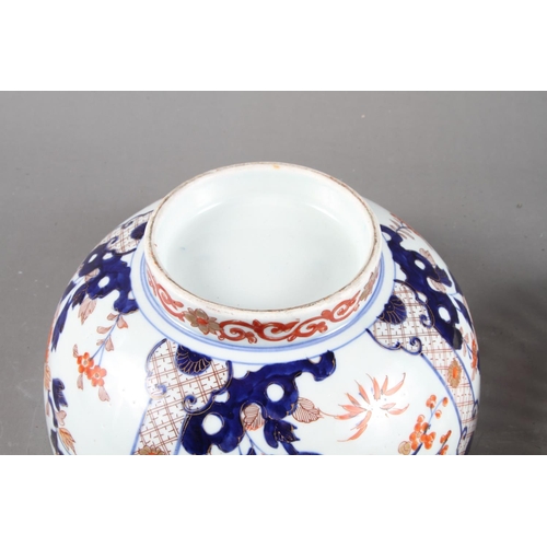 85 - A Chinese Imari bowl with panelled floral decoration, 10