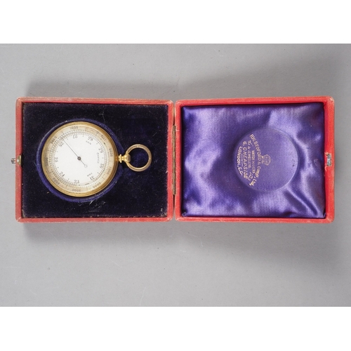 106 - A gilt brass cased pocket barometer with silvered dial, in morocco leather case