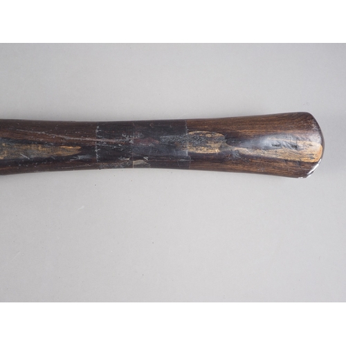 127 - An African carved ebony stick, 38 1/2