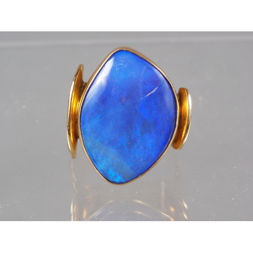 295 - An 18ct gold and opal dress ring, size U, 17.7g