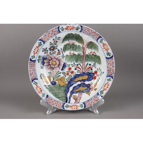 3 - An 18th century chinoiserie decorated blue and white delft charger, 13” dia, another decorated stag,... 