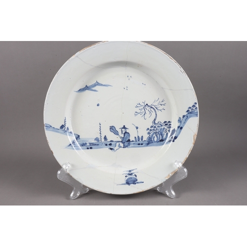 3 - An 18th century chinoiserie decorated blue and white delft charger, 13” dia, another decorated stag,... 