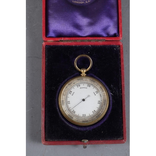 106 - A gilt brass cased pocket barometer with silvered dial, in morocco leather case