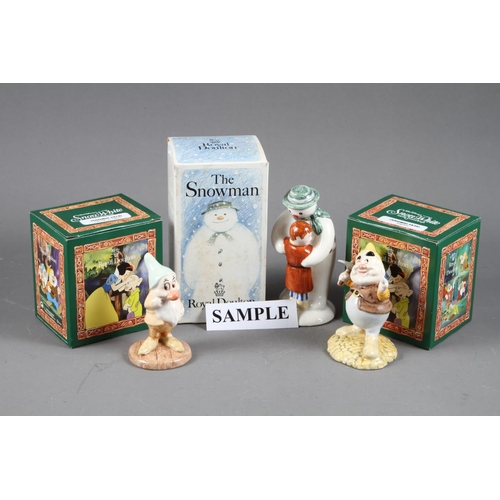 11 - A Royal Doulton Snow White and the Seven Dwarves set, all boxed, and two Royal Doulton “The Sn... 