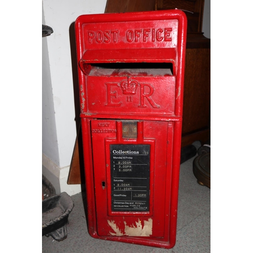 122 - A red painted EIIR Royal Mail post box, 24” high