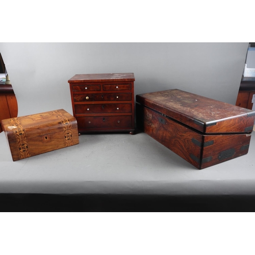 133 - An Edwardian mahogany and line inlaid miniature chest of two short and three long graduated drawers,... 