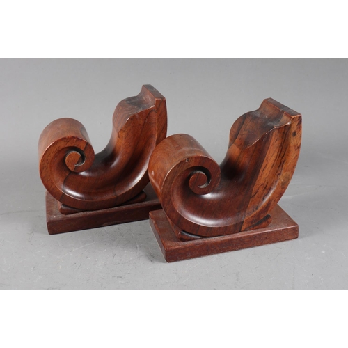 140 - A pair of rosewood scrolled bookends, 6 1/2