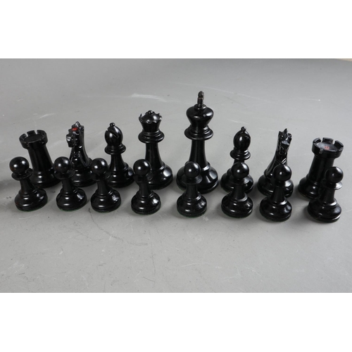 142 - A Staunton box and ebonised chess set, in case