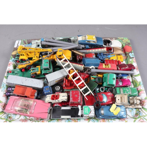 149 - A collection of Matchbox, Dinky and Corgi die-cast models (well played with)