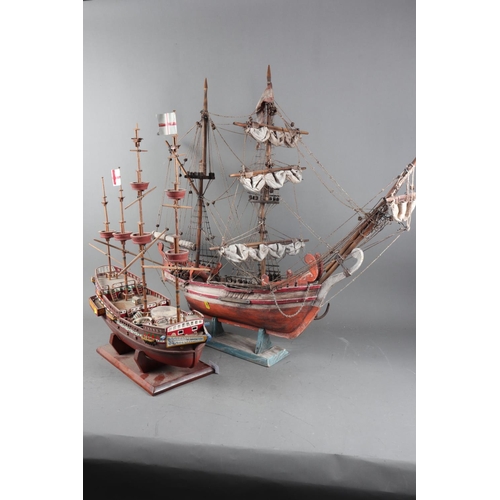 206 - A painted wooden scale model of a galleon, 28” high, and a similar smaller model of the Golden Hind