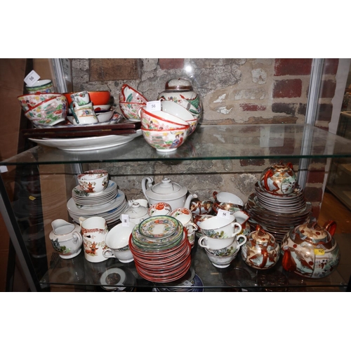 56 - A quantity of mostly Japanese part egg shell teasets and various other china