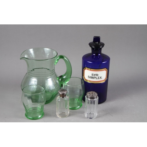 75 - A green glass lemonade jug with two matching glasses, a blue glass chemist jar, 9” high, and t... 