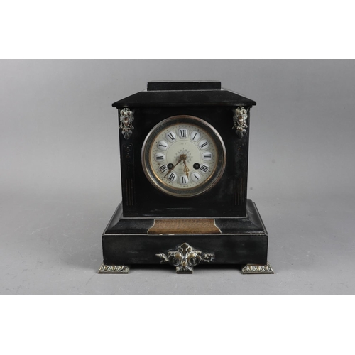 98 - A black marble and brass mounted mantel clock with presentation plaque, cream dial and Arabic numera... 