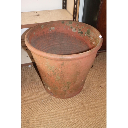 593 - A large terracotta pot, 20 1/2