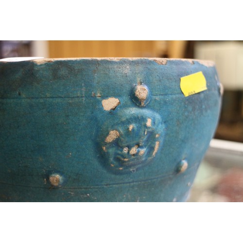 84 - A Chinese turquoise glazed bowl with lion mask decoration, 9” dia, and a floral decorated vase, 7” h... 