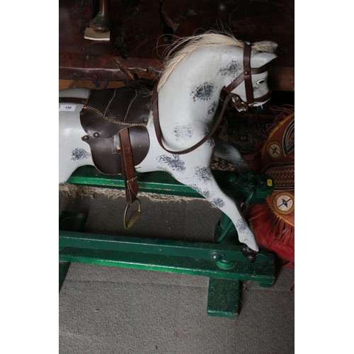 150 - A painted wooden rocking horse, 24” longFloor to ear: 34