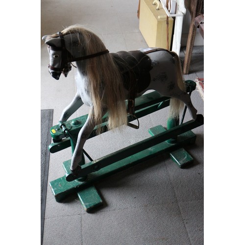 150 - A painted wooden rocking horse, 24” longFloor to ear: 34