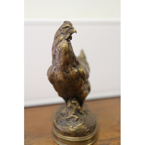 113 - After Auguste Cain, a bronze model hen, 3 1/2” high