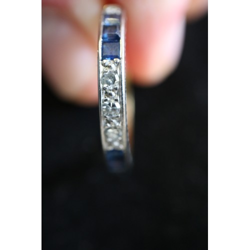 278 - An 18 carat sapphire and diamond half eternity ring, size Q