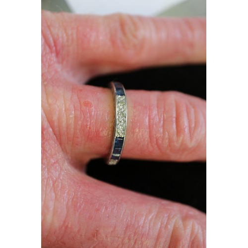 278 - An 18 carat sapphire and diamond half eternity ring, size Q