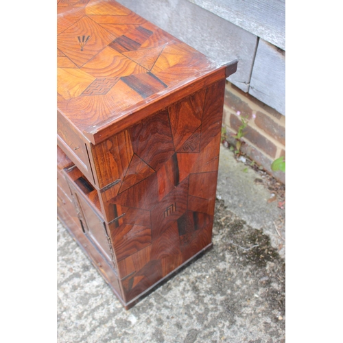 450 - A late 19th century Japanese parquetry work cabinet, fitted one drawer over recess, cupboards and fu... 