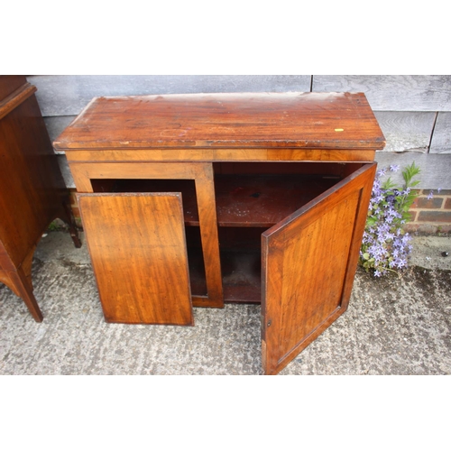 457 - A Victorian mahogany bookcase, the upper section enclosed glazed panelled doors over cupboards, 38” ... 