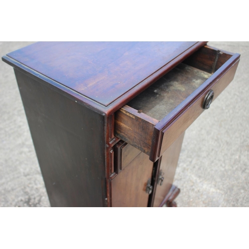 537 - An Edwardian walnut side cabinet, fitted two drawers over cupboard, on cabriole supports and pad fee... 