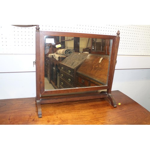 478 - A late 19th century mahogany swing frame toilet mirror, on plateau base, 21