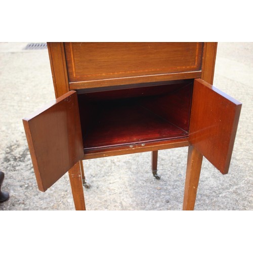 537 - An Edwardian walnut side cabinet, fitted two drawers over cupboard, on cabriole supports and pad fee... 