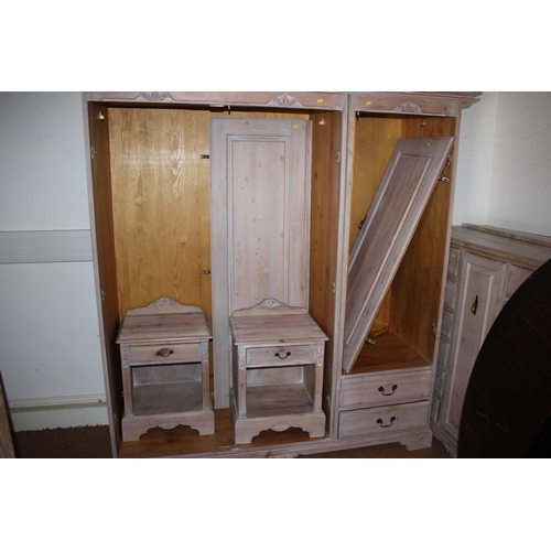 608 - A Jaycee Victorian Collection limed pine combination wardrobe enclosed three doors and fitted two dr... 