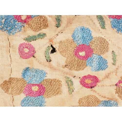 127 - A 19th century embroidered panel with floral designs, 57 1/2” x 38 1/2”