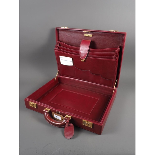 142 - A Must Du Cartier crimson leather attache case