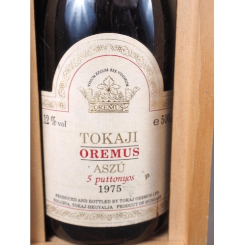 147 - A bottle of 1975 Tokaji Oremus Aszu dessert wine, in wooden box