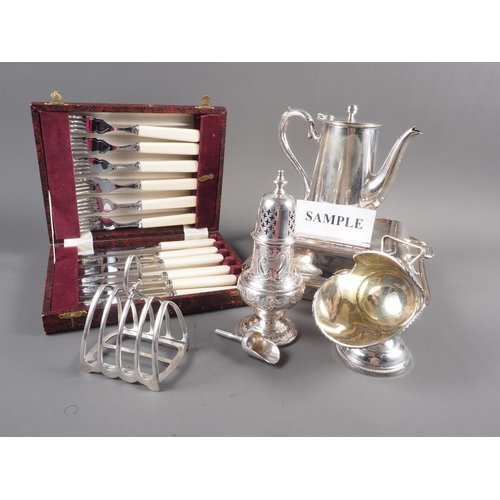 246 - Two silver plated entree dishes and covers, two silver plated swing handled baskets, a Georgian styl... 