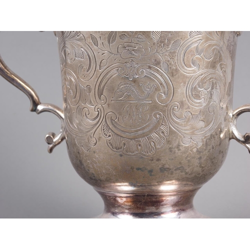 261 - A Georgian silver two-handled loving cup with later chased scrolled decoration, 4 3/4” high, 9oz tro... 