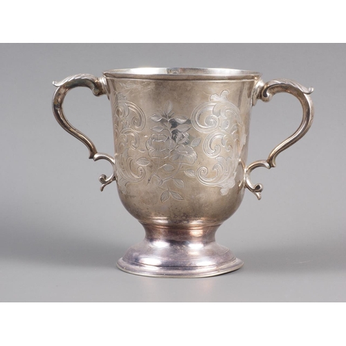 261 - A Georgian silver two-handled loving cup with later chased scrolled decoration, 4 3/4” high, 9oz tro... 