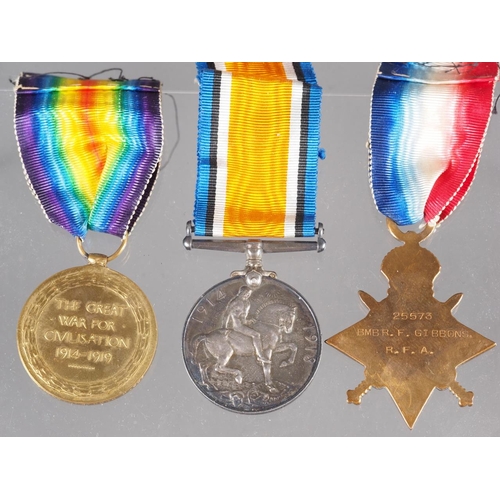 302 - A WWI medal trio, all awarded to 25573 BMBR F. Gibbons R.A, the star has the same naming but with R.... 