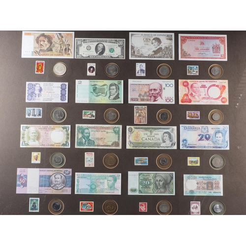 306 - A quantity of bank notes, coins and stamps from around the world, framed, and another similar smalle... 