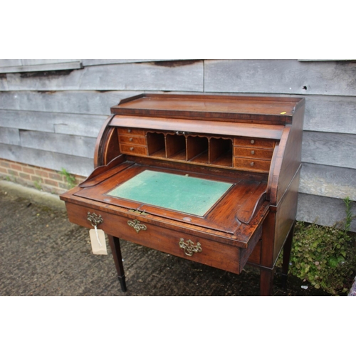 465 - A 19th century mahogany cylinder bureau with ledge back over fitted interior, automatic adjustable w... 