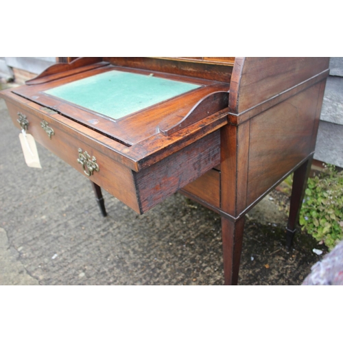 465 - A 19th century mahogany cylinder bureau with ledge back over fitted interior, automatic adjustable w... 